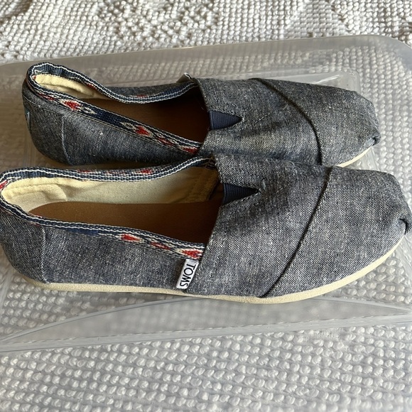 Toms denim look slip ons with navy blue and orange Aztec trim. Size 7 - Picture 6 of 8